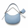 Cartera Steve Madden azul cielo con cadena plateada y mini bolso